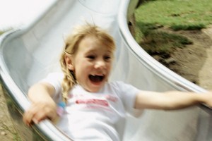 girl on slide playground injury